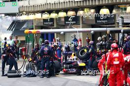 Sebastian Vettel (GER) Red Bull Racing pit stop. 24.11.2013. Formula 1 World Championship, Rd 19, Brazilian Grand Prix, Sao Paulo, Brazil, Race Day.
