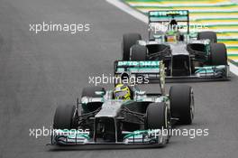 Nico Rosberg (GER) Mercedes AMG F1 W04 leads Lewis Hamilton (GBR) Mercedes AMG F1 W04. 24.11.2013. Formula 1 World Championship, Rd 19, Brazilian Grand Prix, Sao Paulo, Brazil, Race Day.