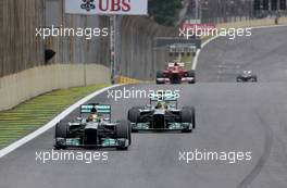 Nico Rosberg (GER), Mercedes GP and Lewis Hamilton (GBR), Mercedes Grand Prix  24.11.2013. Formula 1 World Championship, Rd 19, Brazilian Grand Prix, Sao Paulo, Brazil, Race Day.