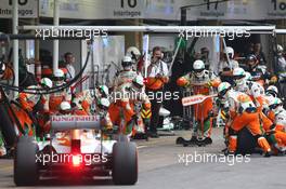 Adrian Sutil (GER) Sahara Force India VJM06 pit stop. 24.11.2013. Formula 1 World Championship, Rd 19, Brazilian Grand Prix, Sao Paulo, Brazil, Race Day.