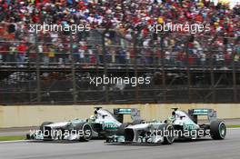 Lewis Hamilton (GBR) Mercedes AMG F1 W04 passes team mate Nico Rosberg (GER) Mercedes AMG F1 W04. 24.11.2013. Formula 1 World Championship, Rd 19, Brazilian Grand Prix, Sao Paulo, Brazil, Race Day.