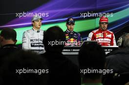 Qualifying top three in the FIA Press Conference (L to R): Nico Rosberg (GER) Mercedes AMG F1, second; Sebastian Vettel (GER) Red Bull Racing, pole position; Fernando Alonso (ESP) Ferrari, third. 23.11.2013. Formula 1 World Championship, Rd 19, Brazilian Grand Prix, Sao Paulo, Brazil, Qualifying Day.