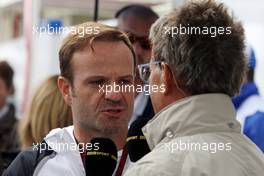 (L to R): Rubens Barrichello (BRA) talks with Eddie Jordan (IRE) BBC Television Pundit. 23.11.2013. Formula 1 World Championship, Rd 19, Brazilian Grand Prix, Sao Paulo, Brazil, Qualifying Day.