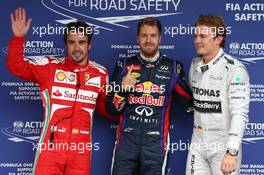 Pole for Sebastian Vettel (GER) Red Bull Racing, 2nd for Nico Rosberg (GER) Mercedes AMG F1 W04 and 3rd for Fernando Alonso (ESP) Ferrari. 23.11.2013. Formula 1 World Championship, Rd 19, Brazilian Grand Prix, Sao Paulo, Brazil, Qualifying Day.