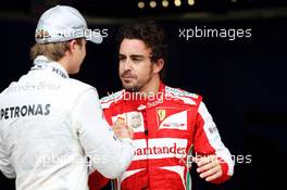 (L to R): Nico Rosberg (GER) Mercedes AMG F1 and Fernando Alonso (ESP) Ferrari in parc ferme. 23.11.2013. Formula 1 World Championship, Rd 19, Brazilian Grand Prix, Sao Paulo, Brazil, Qualifying Day.