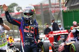 Sebastian Vettel (GER) Red Bull Racing get pole. 23.11.2013. Formula 1 World Championship, Rd 19, Brazilian Grand Prix, Sao Paulo, Brazil, Qualifying Day.