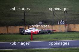 Sergio Perez (MEX) McLaren MP4-28 crashes during qualifying. 23.11.2013. Formula 1 World Championship, Rd 19, Brazilian Grand Prix, Sao Paulo, Brazil, Qualifying Day.