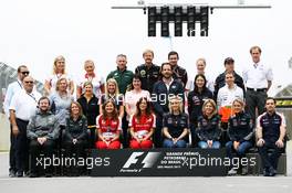 The Press Officers end of season group photograph. 24.11.2013. Formula 1 World Championship, Rd 19, Brazilian Grand Prix, Sao Paulo, Brazil, Race Day.