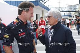 (L to R): Christian Horner (GBR) Red Bull Racing Team Principal with Bernie Ecclestone (GBR) CEO Formula One Group (FOM). 24.11.2013. Formula 1 World Championship, Rd 19, Brazilian Grand Prix, Sao Paulo, Brazil, Race Day.