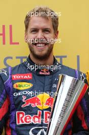 Sebastian Vettel (GER), Red Bull Racing receive the DHL fastest lap award 24.11.2013. Formula 1 World Championship, Rd 19, Brazilian Grand Prix, Sao Paulo, Brazil, Race Day.