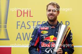 Sebastian Vettel (GER) Red Bull Racing receives his DHL fastest lap award 24.11.2013. Formula 1 World Championship, Rd 19, Brazilian Grand Prix, Sao Paulo, Brazil, Race Day.