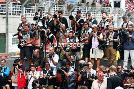 Photographers at the drivers end of season photograph. 24.11.2013. Formula 1 World Championship, Rd 19, Brazilian Grand Prix, Sao Paulo, Brazil, Race Day.