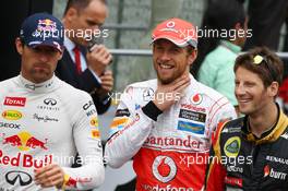 (L to R): Mark Webber (AUS) Red Bull Racing; Jenson Button (GBR) McLaren; and Romain Grosjean (FRA) Lotus F1 Team on the drivers parade. 24.11.2013. Formula 1 World Championship, Rd 19, Brazilian Grand Prix, Sao Paulo, Brazil, Race Day.