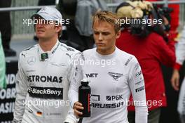 (L to R): Nico Rosberg (GER) Mercedes AMG F1 and Max Chilton (GBR) Marussia F1 Team on the drivers parade. 24.11.2013. Formula 1 World Championship, Rd 19, Brazilian Grand Prix, Sao Paulo, Brazil, Race Day.
