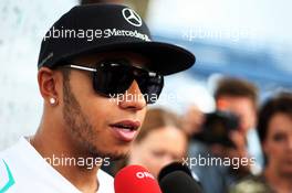 Lewis Hamilton (GBR) Mercedes AMG F1 with the media. 21.11.2013. Formula 1 World Championship, Rd 19, Brazilian Grand Prix, Sao Paulo, Brazil, Preparation Day.