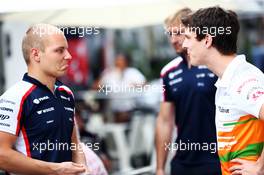 (L to R): Valtteri Bottas (FIN) Williams with James Calado (GBR) Sahara Force India Third Driver. 21.11.2013. Formula 1 World Championship, Rd 19, Brazilian Grand Prix, Sao Paulo, Brazil, Preparation Day.