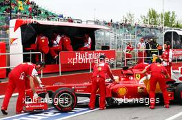 Fernando Alonso (ESP) Ferrari F138 in the pits. 07.06.2013. Formula 1 World Championship, Rd 7, Canadian Grand Prix, Montreal, Canada, Practice Day.