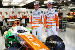 (L to R): Adrian Sutil (GER) Sahara Force India F1 and Paul di Resta (GBR) Sahara Force India F1 celebrate the 100th GP for the Sahara Force India F1 Team. 07.06.2013. Formula 1 World Championship, Rd 7, Canadian Grand Prix, Montreal, Canada, Practice Day.