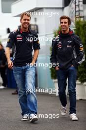 (L to R): Sebastian Vettel (GER) Red Bull Racing with Antonio Felix da Costa (POR) Red Bull Racing Test Driver. 07.06.2013. Formula 1 World Championship, Rd 7, Canadian Grand Prix, Montreal, Canada, Practice Day.