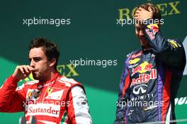2nd place for Fernando Alonso (ESP) Ferrari F138 and 1st for Sebastian Vettel (GER) Red Bull Racing. 09.06.2013. Formula 1 World Championship, Rd 7, Canadian Grand Prix, Montreal, Canada, Race Day.