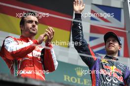 Race winner Sebastian Vettel (GER) Red Bull Racing celebrates on the podium with second placed Fernando Alonso (ESP) Ferrari. 09.06.2013. Formula 1 World Championship, Rd 7, Canadian Grand Prix, Montreal, Canada, Race Day.