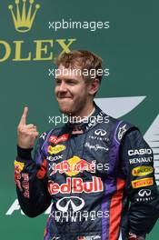 Race winner Sebastian Vettel (GER) Red Bull Racing celebrates on the podium. 09.06.2013. Formula 1 World Championship, Rd 7, Canadian Grand Prix, Montreal, Canada, Race Day.