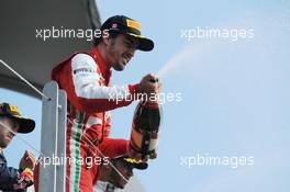Fernando Alonso (ESP) Ferrari celebrates his second position on the podium. 09.06.2013. Formula 1 World Championship, Rd 7, Canadian Grand Prix, Montreal, Canada, Race Day.