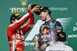 (L to R): Fernando Alonso (ESP) Ferrari celebrates his second position on the podium with race winner Sebastian Vettel (GER) Red Bull Racing. 09.06.2013. Formula 1 World Championship, Rd 7, Canadian Grand Prix, Montreal, Canada, Race Day.