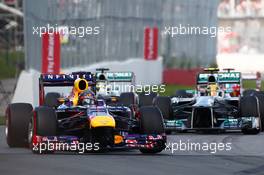 Sebastian Vettel (GER) Red Bull Racing RB9 leads at the start of the race. 09.06.2013. Formula 1 World Championship, Rd 7, Canadian Grand Prix, Montreal, Canada, Race Day.