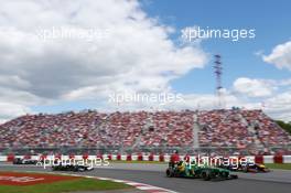 Mark Webber (AUS) Red Bull Racing RB9 and Giedo van der Garde (NLD) Caterham CT03 leads Valtteri Bottas (FIN) Williams FW35 and Nico Hulkenberg (GER) Sauber C32. 09.06.2013. Formula 1 World Championship, Rd 7, Canadian Grand Prix, Montreal, Canada, Race Day.