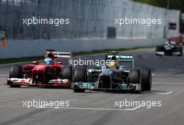 Lewis Hamilton (GBR), Mercedes Grand Prix and Fernando Alonso (ESP), Scuderia Ferrari  09.06.2013. Formula 1 World Championship, Rd 7, Canadian Grand Prix, Montreal, Canada, Race Day.