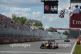Race winner Sebastian Vettel (GER) Red Bull Racing celebrates takes the chequered flag at the end of the race  09.06.2013. Formula 1 World Championship, Rd 7, Canadian Grand Prix, Montreal, Canada, Race Day.