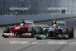 Lewis Hamilton (GBR), Mercedes Grand Prix and Fernando Alonso (ESP), Scuderia Ferrari  09.06.2013. Formula 1 World Championship, Rd 7, Canadian Grand Prix, Montreal, Canada, Race Day.