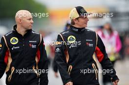 Kimi Raikkonen (FIN) Lotus F1 Team with Mark Arnall (GBR) Personal Trainer.