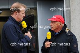 (L to R): Florian Konig (GER) RTL TV Presenter with Niki Lauda (AUT) Mercedes Non-Executive Chairman.