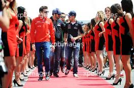 (L to R): Jules Bianchi (FRA) Marussia F1 Team; Jean-Eric Vergne (FRA) Scuderia Toro Rosso; and Sebastian Vettel (GER) Red Bull Racing on the drivers parade. 09.06.2013. Formula 1 World Championship, Rd 7, Canadian Grand Prix, Montreal, Canada, Race Day.