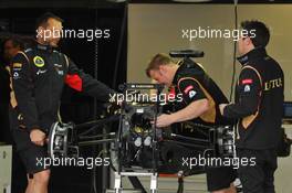 The Lotus F1 E21 of Kimi Raikkonen (FIN) Lotus F1 Team is prepared by mechanics. 06.06.2013. Formula 1 World Championship, Rd 7, Canadian Grand Prix, Montreal, Canada, Preparation Day.