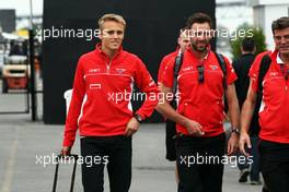 (L to R): Max Chilton (GBR) Marussia F1 Team with Sam Village (GBR) Marussia F1 Team and Graeme Lowdon (GBR) Marussia F1 Team Chief Executive Officer. 06.06.2013. Formula 1 World Championship, Rd 7, Canadian Grand Prix, Montreal, Canada, Preparation Day.