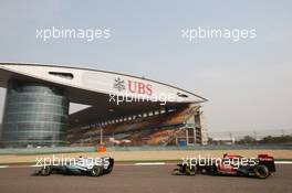 Lewis Hamilton (GBR) Mercedes AMG F1 W04 leads Kimi Raikkonen (FIN) Lotus F1 E21. 12.04.2013. Formula 1 World Championship, Rd 3, Chinese Grand Prix, Shanghai, China, Practice Day.