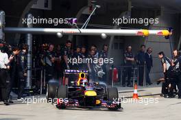 Sebastian Vettel (GER) Red Bull Racing RB9 leaves the pits. 12.04.2013. Formula 1 World Championship, Rd 3, Chinese Grand Prix, Shanghai, China, Practice Day.