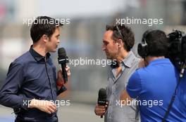 (L to R): Thomas Senecal (FRA) Canal+ F1 Chief Editor and TV Presenter with Frank Montangy (FRA) Canal+ TV Presenter. 12.04.2013. Formula 1 World Championship, Rd 3, Chinese Grand Prix, Shanghai, China, Practice Day.
