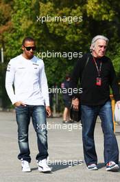 Lewis Hamilton (GBR) Mercedes AMG F1 with Tom Shine (USA) Driver Manager. 12.04.2013. Formula 1 World Championship, Rd 3, Chinese Grand Prix, Shanghai, China, Practice Day.