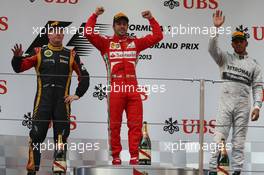 1st place Fernando Alonso (ESP) Ferrari, 2nd place Kimi Raikkonen (FIN) Lotus F1 Team and 3rd place Lewis Hamilton (GBR) Mercedes AMG F1  14.04.2013. Formula 1 World Championship, Rd 3, Chinese Grand Prix, Shanghai, China, Race Day.