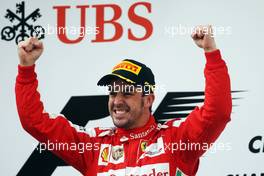 Race winner Fernando Alonso (ESP) Ferrari celebrates on the podium.  14.04.2013. Formula 1 World Championship, Rd 3, Chinese Grand Prix, Shanghai, China, Race Day.