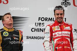 The podium (L to R): second placed Kimi Raikkonen (FIN) Lotus F1 Team with race winner Fernando Alonso (ESP) Ferrari. 14.04.2013. Formula 1 World Championship, Rd 3, Chinese Grand Prix, Shanghai, China, Race Day.