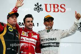 The podium (L to R): Kimi Raikkonen (FIN) Lotus F1 Team, second; Fernando Alonso (ESP) Ferrari, race winner; Lewis Hamilton (GBR) Mercedes AMG F1, third. 14.04.2013. Formula 1 World Championship, Rd 3, Chinese Grand Prix, Shanghai, China, Race Day.