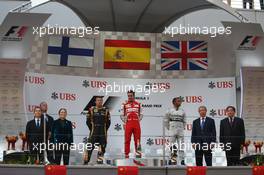 1st place Fernando Alonso (ESP) Ferrari, 2nd place Kimi Raikkonen (FIN) Lotus F1 Team and 3rd place Lewis Hamilton (GBR) Mercedes AMG F1  14.04.2013. Formula 1 World Championship, Rd 3, Chinese Grand Prix, Shanghai, China, Race Day.