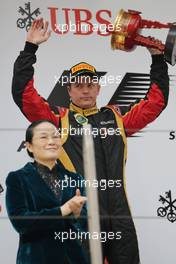 Kimi Raikkonen (FIN) Lotus F1 Team celebrates his second position on the podium. 14.04.2013. Formula 1 World Championship, Rd 3, Chinese Grand Prix, Shanghai, China, Race Day.