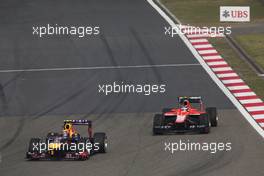 Mark Webber (AUS) Red Bull Racing RB9 passes Max Chilton (GBR) Marussia F1 Team MR02. 14.04.2013. Formula 1 World Championship, Rd 3, Chinese Grand Prix, Shanghai, China, Race Day.