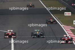 Fernando Alonso (ESP) Ferrari F138 takes the leads as Felipe Massa (BRA) Ferrari F138 passes Lewis Hamilton (GBR) Mercedes AMG F1 W04. 14.04.2013. Formula 1 World Championship, Rd 3, Chinese Grand Prix, Shanghai, China, Race Day.